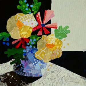 Fun yellow and red flowers in a blue vase created with paper and acrylic paint.